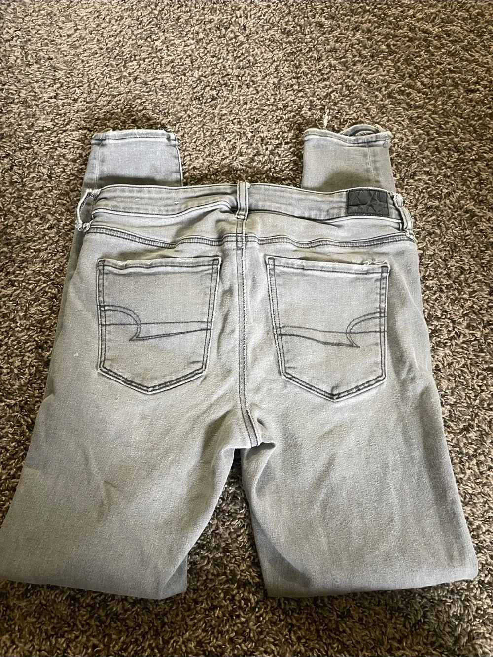 American Eagle Outfitters Light Gray Ripped Skinny Jeans
